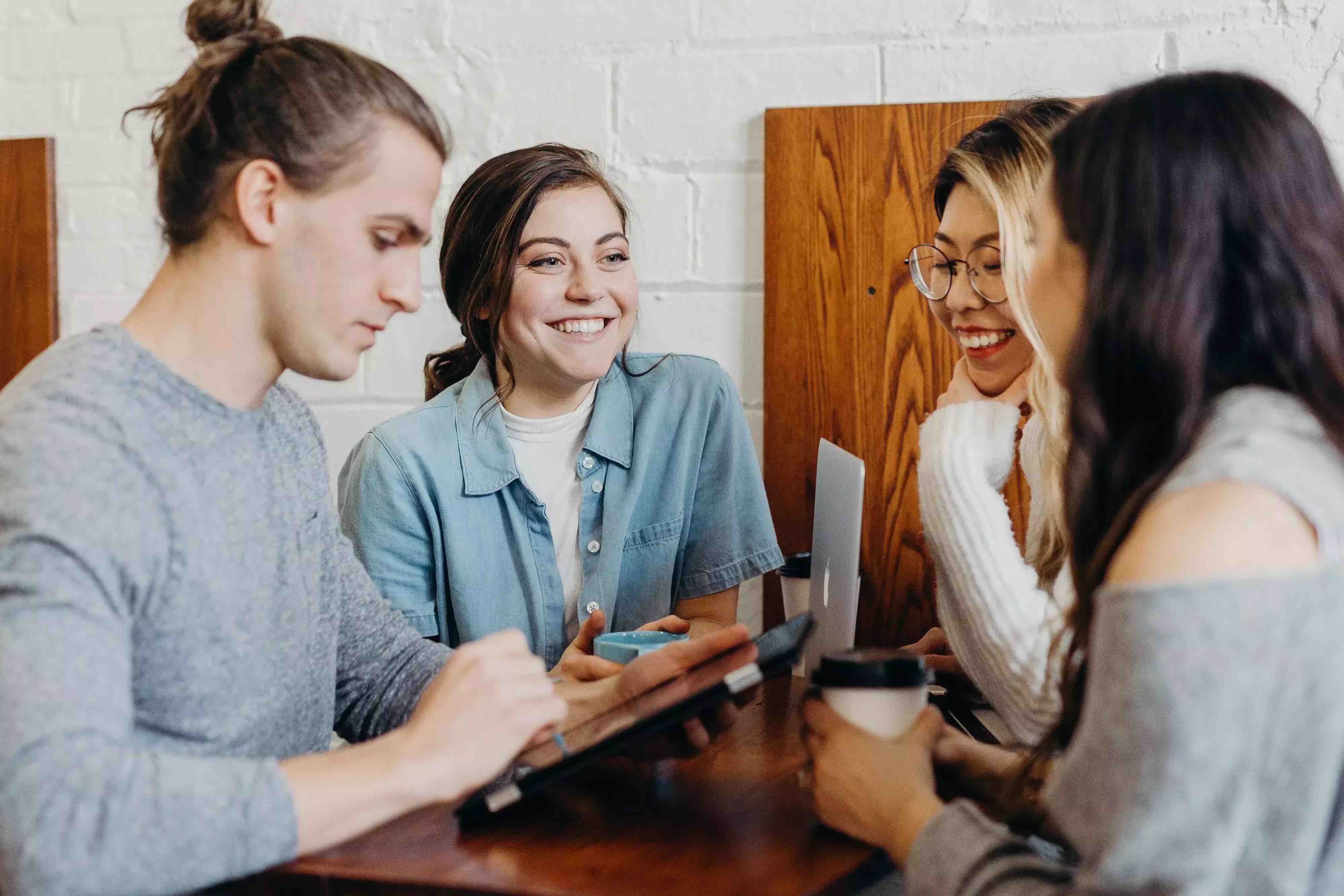 4 People Collaborating On A Project